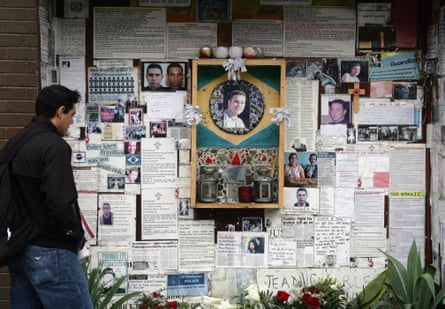 A man stops to read messages on a shrine dedicated to Jean Charles de Menezes outside Stockwell Underground station, where he was shot by police in July 2025