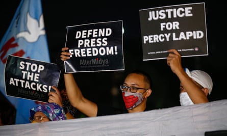 Protesters hold a rally in Manila in October demanding government action on media killings after Percy Mabasa’s death.