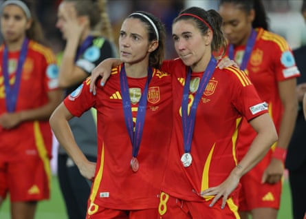 Aitana Bonmatí of Spain and Mariona Caldentey of Spain look dejected after the World Cup holders failed to add the European Championship.