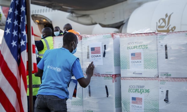 A Unicef worker checks boxes of the Moderna Covid-19 vaccine after their arrival at the airport in Nairobi, Kenya. 