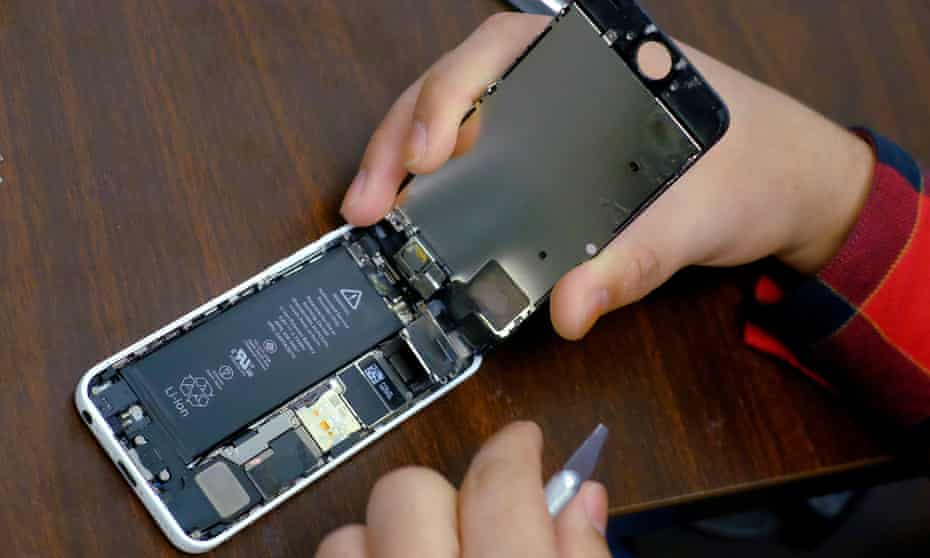 The inside of an iPhone, seen in a repair store in New York.