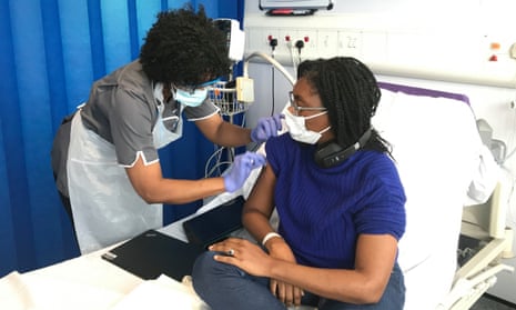 Kemi Badenoch, the UK’s minister for equalities, receiving her first vaccination as part of the Novavax phase 3 trial in October.