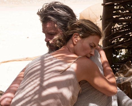 Charlize Theron as the nymph Calypso and Matt Damon as Odysseus embracing in a still from the film