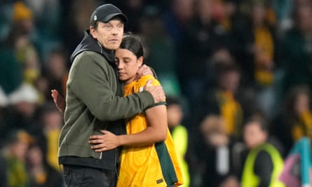 Australia’s head coach Tony Gustavsson consoles Sam Kerr after defeat against England