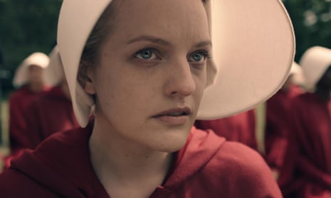 Elisabeth Moss as Offred.