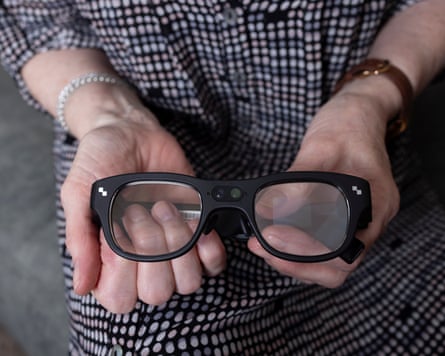 An up-close image of the glasses which have a small camera in the centre