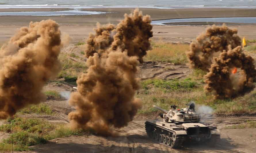 Tanks are deployed to carry out a shore defence operation as part of a military exercise in Taiwan.