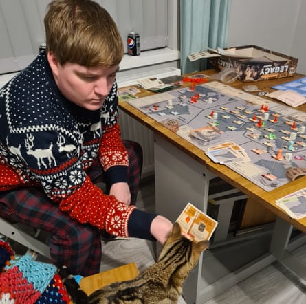 John Severn playing boardgames