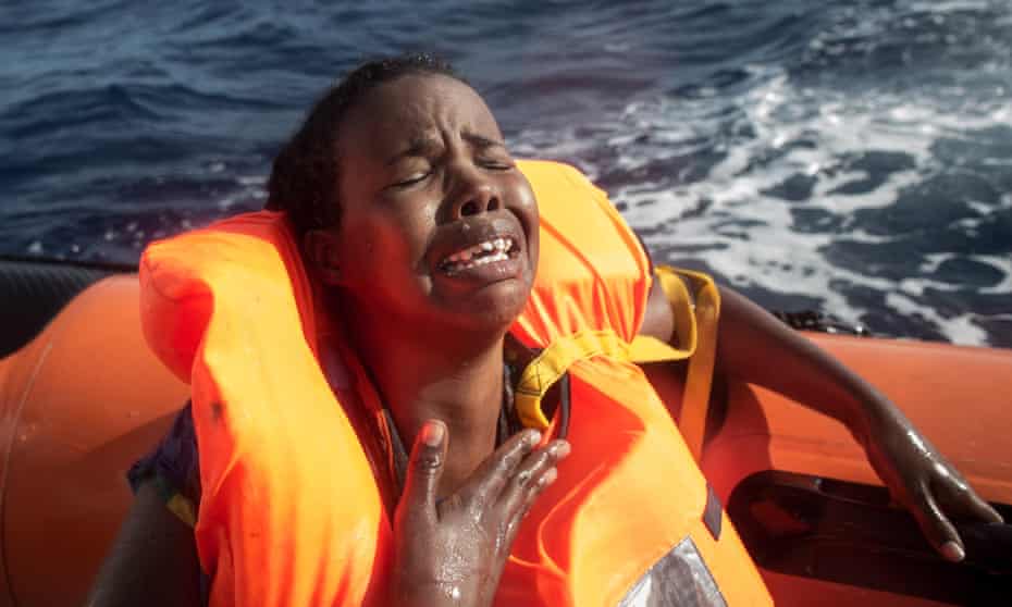 Migrant in a rescue boat