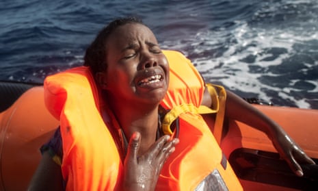 Migrant in a rescue boat