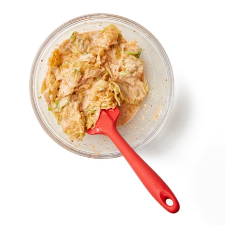 Kimchi is in a bowl.