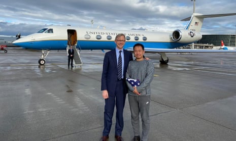 The US special representative for Iran, Brian Hook, stands with Xiyue Wang in Zurich, Switzerland