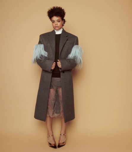 Fringe benefits: Lydia West wears coat, jumper, skirt and shoes by prada.com; earrings by shaunleane.com.