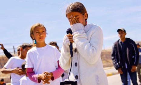 Ana Pavón, a migrant girl from Venezuela, reacts at a protest during the visit of President Andrés Manuel López Obrador in Ciudad Juárez, Mexico, on Friday.