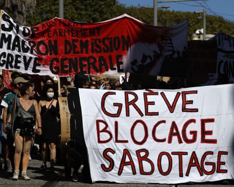 People marching with large banners