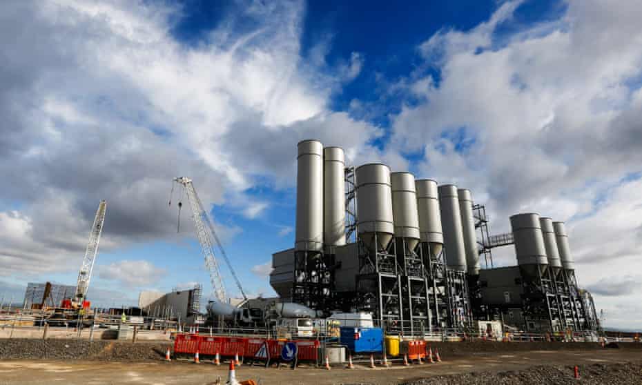 The concrete batching plant stands on the horizon as work recommences at the Hinkley Point C nuclear power station, operated by Electricite de France SA’s (EDF), near Bridgwater, U.K.