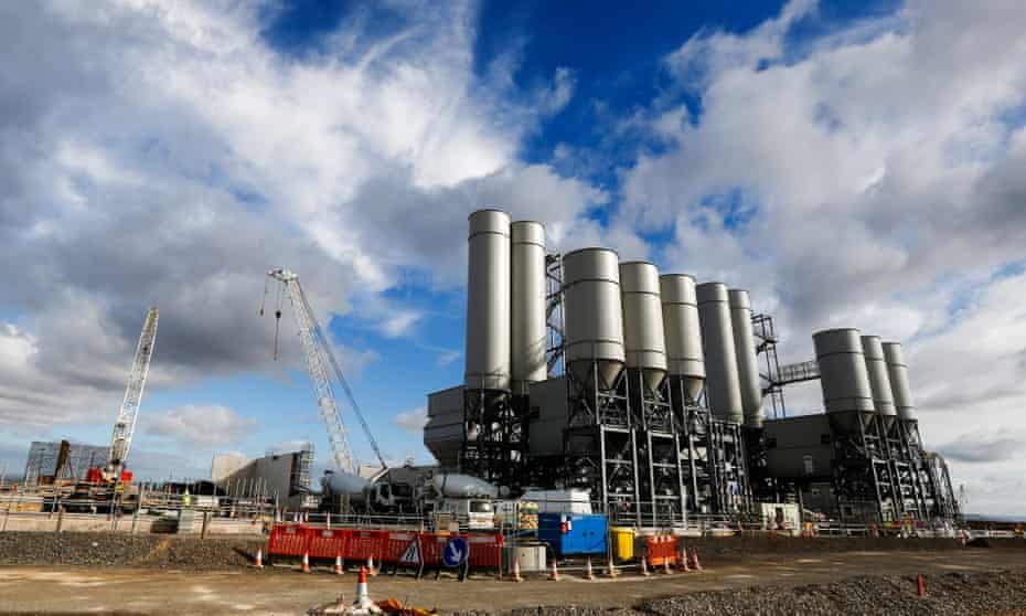 The concrete batching plant stands on the horizon as work recommences at the Hinkley Point C nuclear power station