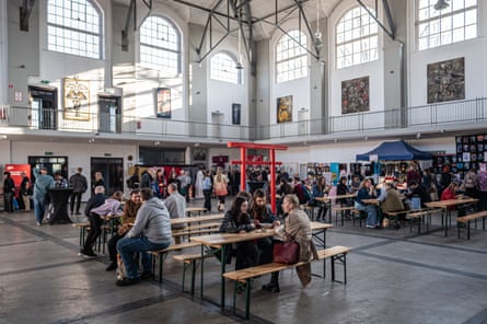 People eat lunch and visit the booths at a Japan-themed fair at the Wilson Shaft Gallery, an exhibition space housed in the former “Wieczorek” coal mine, which dates back to 1826.