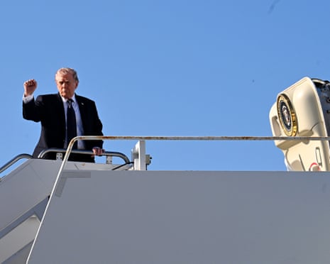 Donald Trump boards Air Force One at Palm Beach international airport on Sunday.