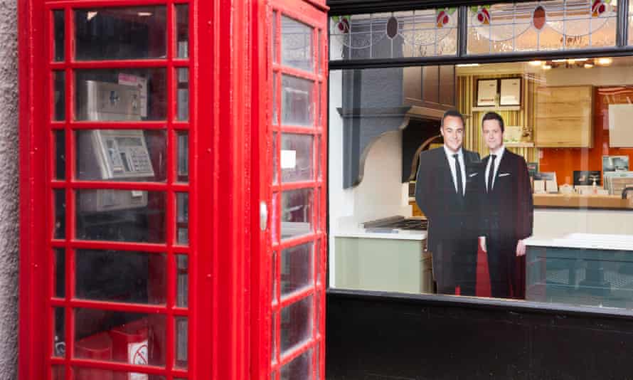 Ant and Dec cardboard cutouts are seen in a shop window in Abergele