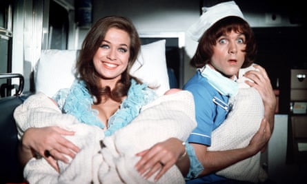 Kenneth Cope (dressed as a nurse) with Valerie Leon in Carry On Matron, 1972.