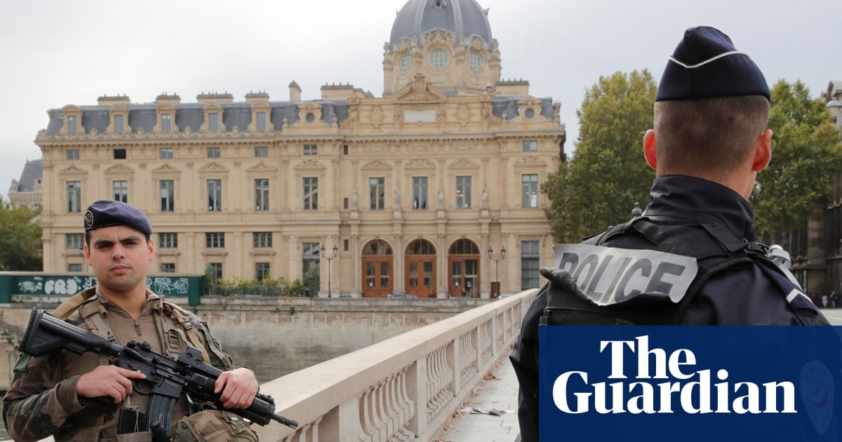 At least four officers dead in attack at Paris police headquarters