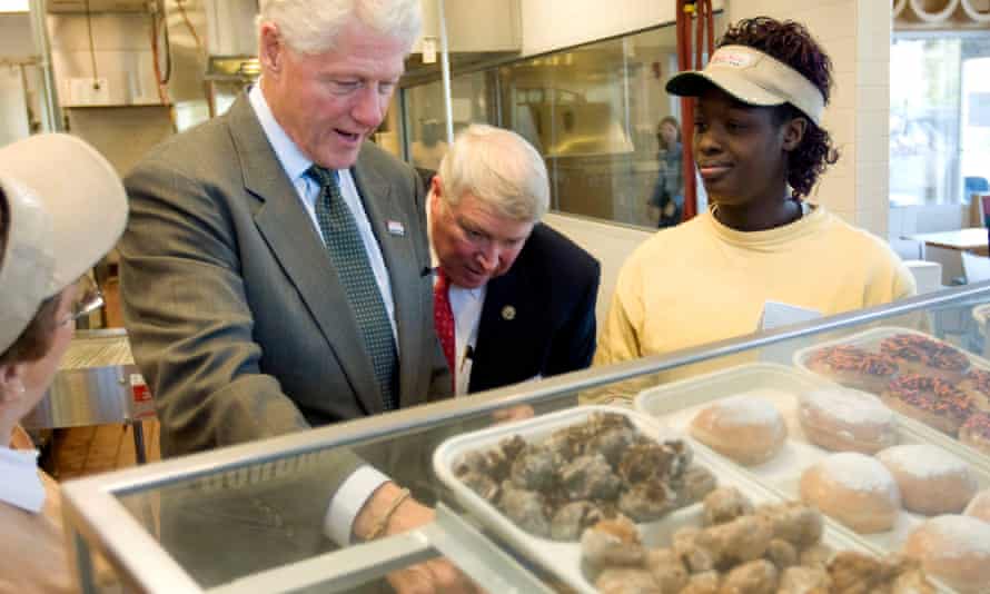 Bill Clinton pauses at the doughnuts in 2007.
