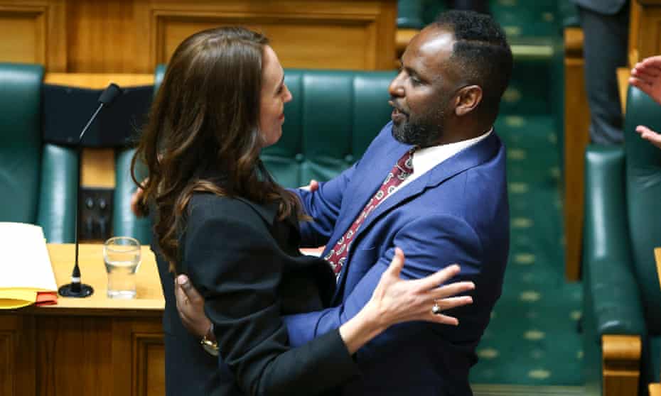Jacinda Ardern hugs Labour MP Ibrahim Omer after his maiden speech in parliament.