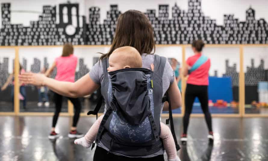 A mother and baby at a dance session in Nyíregyháza, Hungary