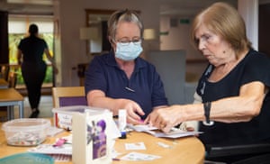 Resident Betty Colligan, right, works on arts and crafts at Meldrum House