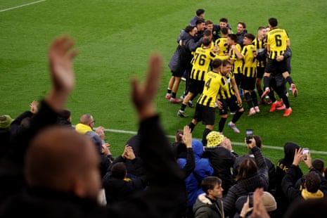 AEK Athens players celebrate securing a draw against Manchester City in the Uefa Youth League