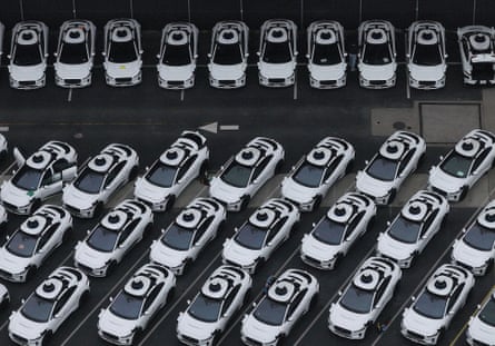 Fleet of waymo cars photographed from above