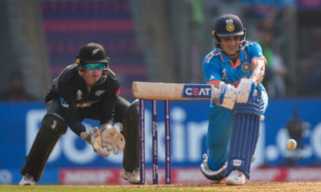 Gill plays a shot