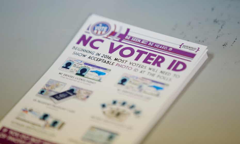 A pile of government pamphlets explaining North Carolina’s controversial voter ID law.