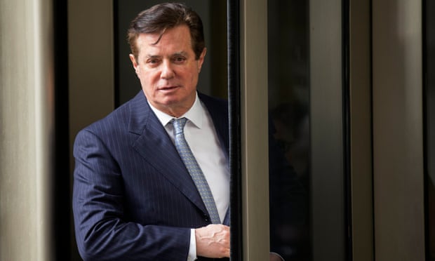Paul Manafort departs the federal court house after a hearing in Washington DC on 14 February 2018.