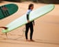Lucy Small prepares to surf at the Bells Beach Longboard Classic in 2023