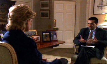 Screenshot over Diana's shoulder of Martin Bashir, seated, asking her questions