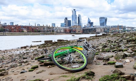 A Lime bike, dumped in the Thames and washed up on the shore at Blackfriars, London.