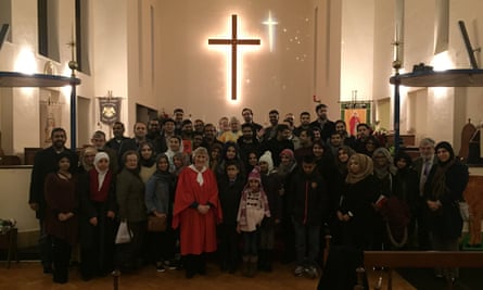 Muslims celebrate midnight mass with Christians at St Alban’s church in north London last Christmas Eve.