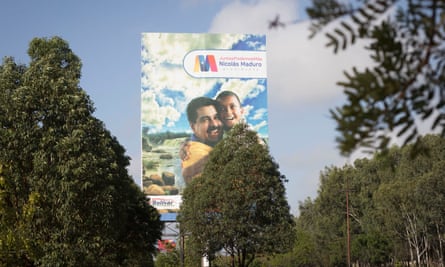 Political propaganda with Nicolás Maduro hugging a child, seen in the streets of Puerto Ordaz, Venezuela.