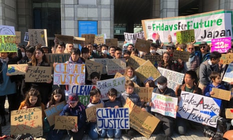 Students gathered outside United Nations University in Tokyo as part of the global climate strike.