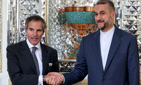 Rafael Grossi shaking hands with Hossein Amir-Abdollahian