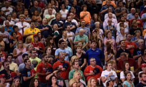 The crowd stands during the pledge of allegiance in Huntington, West Virginia.