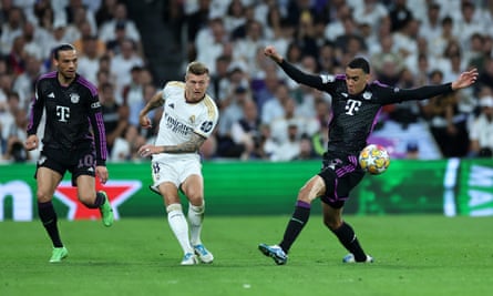 Real Madrid’s Toni Kroos (centre) battles with Bayern Munich’s Leroy Sane (left) and Jamal Musiala during their Champions League semi-final, second leg