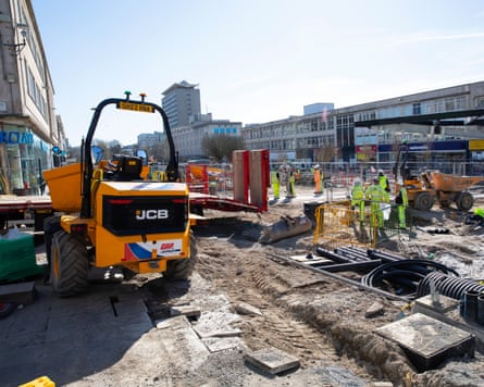 People in hi-vis clothes work on the regeneration scheme for Plymouth city centre