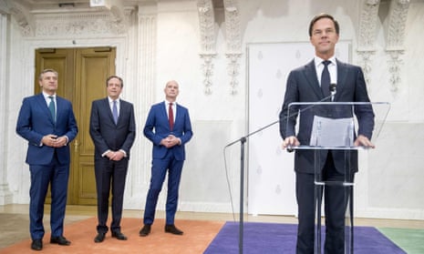 From right: Dutch PM Mark Rutte of the People’s Party for Freedom and Democracy, Gert-Jan Segers of the Christian Union, Alexander Pechtold of D66 and Sybrand Buma of the Christian Democrats present their government pact in The Hague on Tuesday.