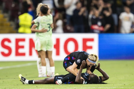 Chloe Kelly and Michelle Agyemang celebrate with a hug