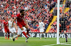 Mohamed Salah just fails to reach Firmino’s cross.
