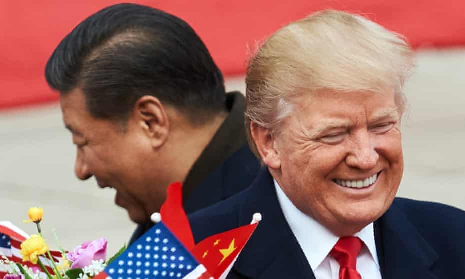 Donald Trump and China’s president, Xi Jinping, during a meeting in Beijing on 9 November 2017. 