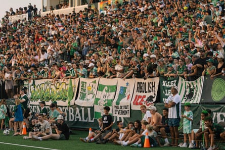 A picture of Vermont Green supporters with numerous political and social justice banners.